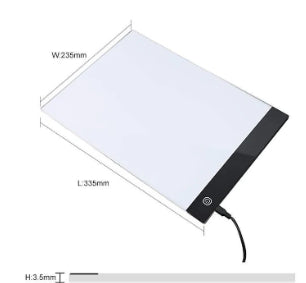 Artist at work on portrait LED Light Drawing Board